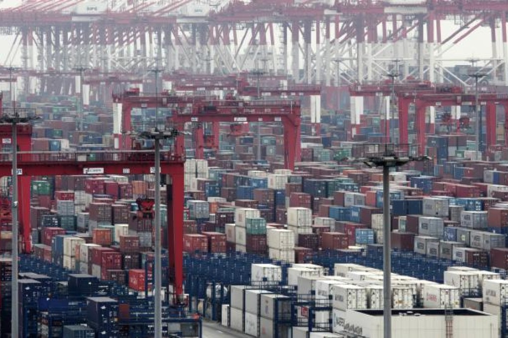 China has denied reports it passed the United States as the largest trading nation, saying that it still trails when the values of goods are calculated using comparable free-on-board (FOB) prices. Photo: Bloomberg
