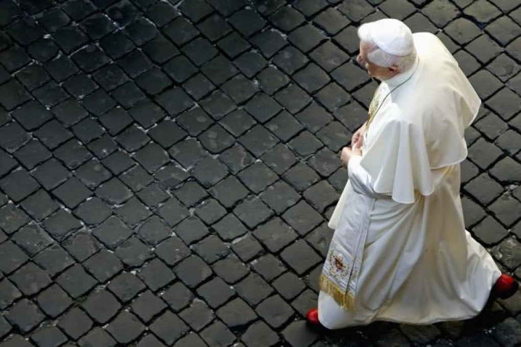 Pope Benedict XVI walking at the Vatican. Photo: Reuters