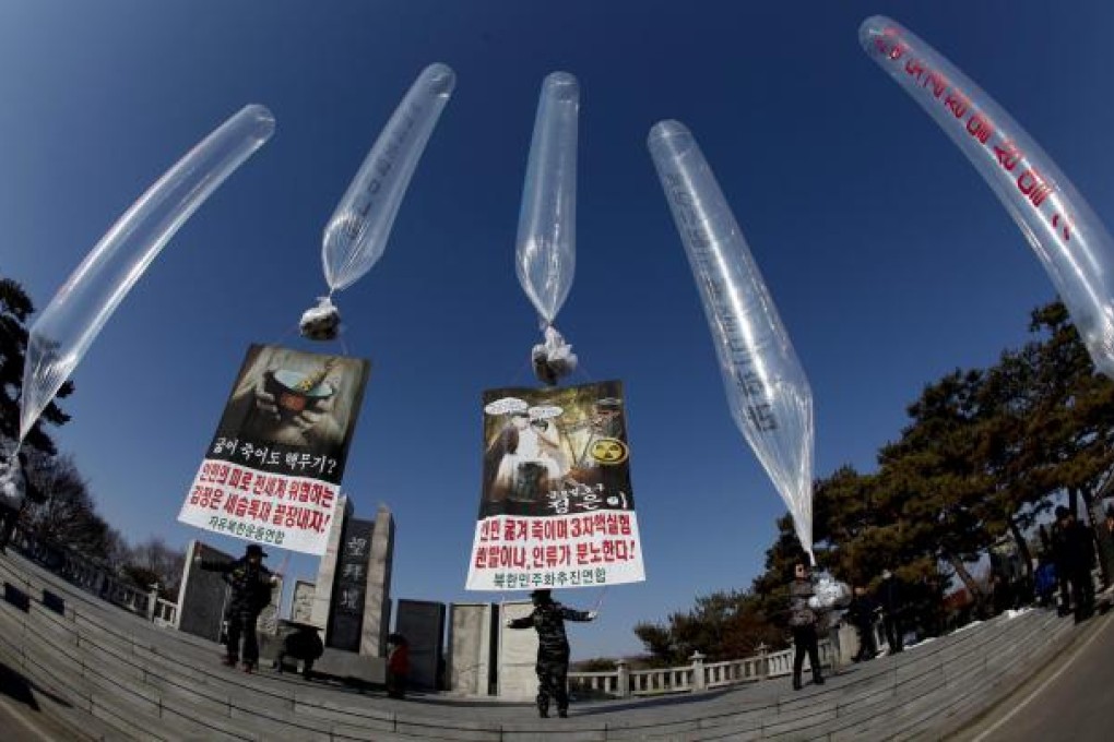 Balloons with anti-Pyongyang messages. Photo: EPA