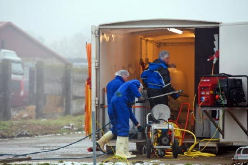 Desinfection equipment being prepared on Saturday at a company near Seelow, Brandenburg state, Germany, where ducks have been diganosed with bird flu. Photo: EPA