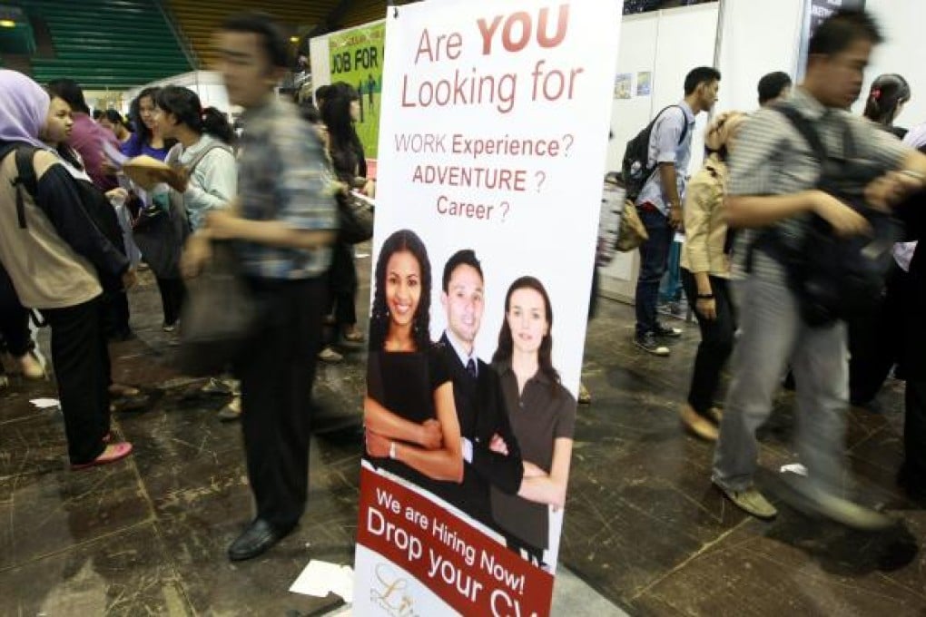 Many youngsters are looking for jobs in Indonesia. Photo: EPA