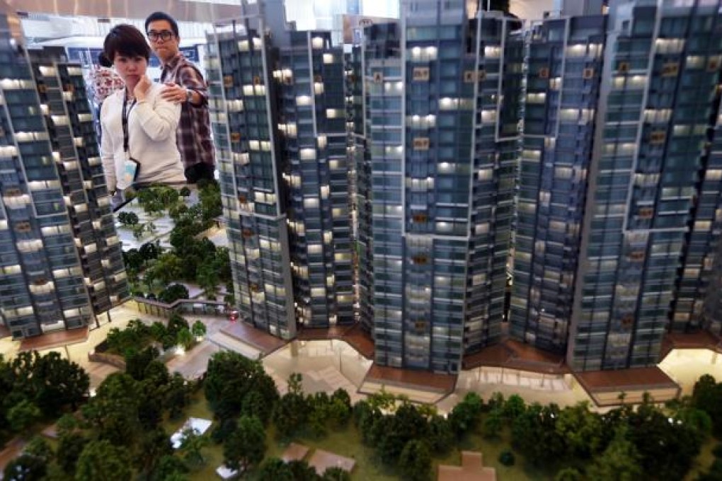The government has announced earlier a new 15 percent property tax for all non-local buyers, and it will also increase an existing tax aimed at curbing short-term property speculation. Photo: Sam Tsang