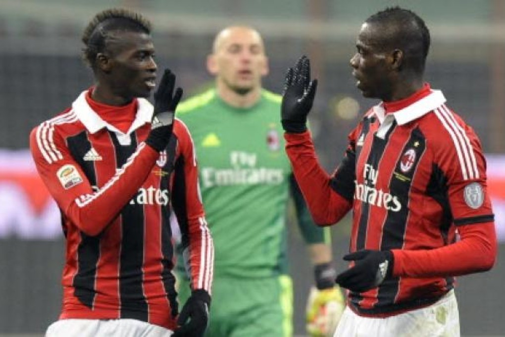 AC Milan's Mario Balotelli (right) celebrates with teammate Niang during their Italian Serie A soccer match against Parma at the San Siro stadium in Milan. Photo: Reuters
