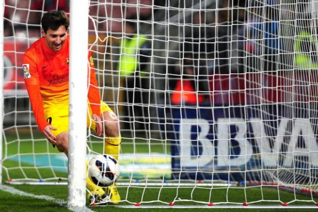 Barcelona's Lionel Messi after scoring against Granada. Photo: AFP