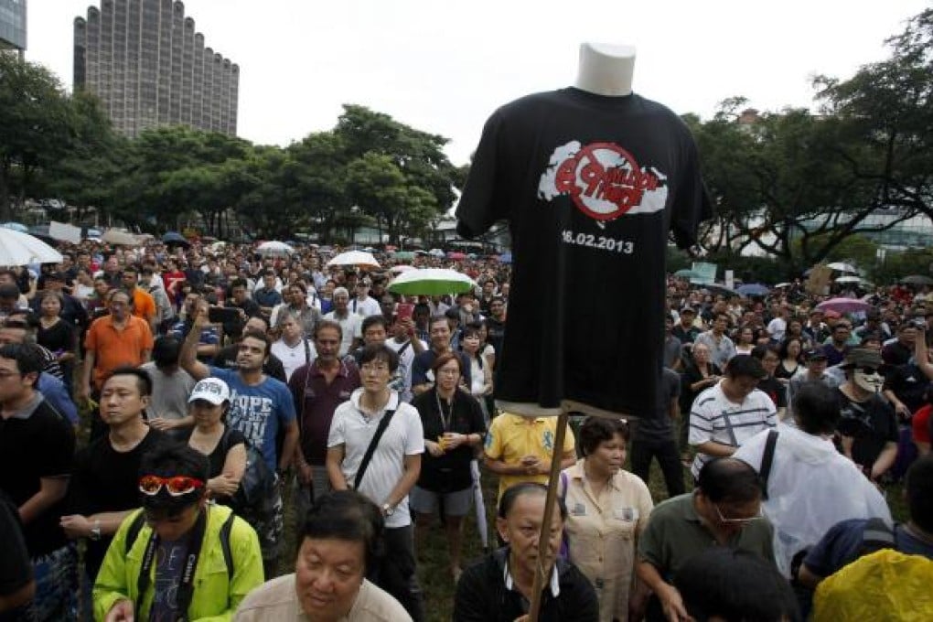 Singaporeans express their opposition to government population policy. Photo: Reuters