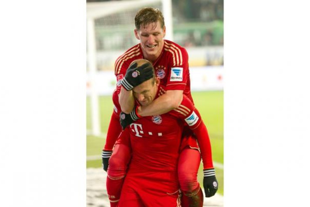 Joy for Bastian Schweinsteiger and Arjen Robben. Photo: EPA