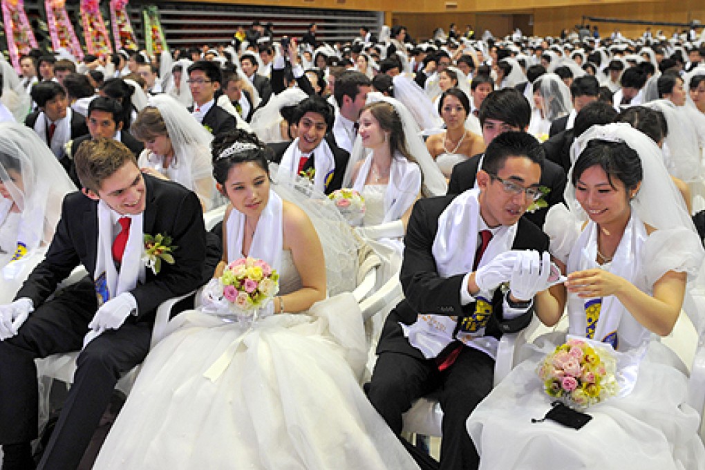Some 3,500 couples took part in the Unification Church's mass wedding ceremony. Photo: AFP