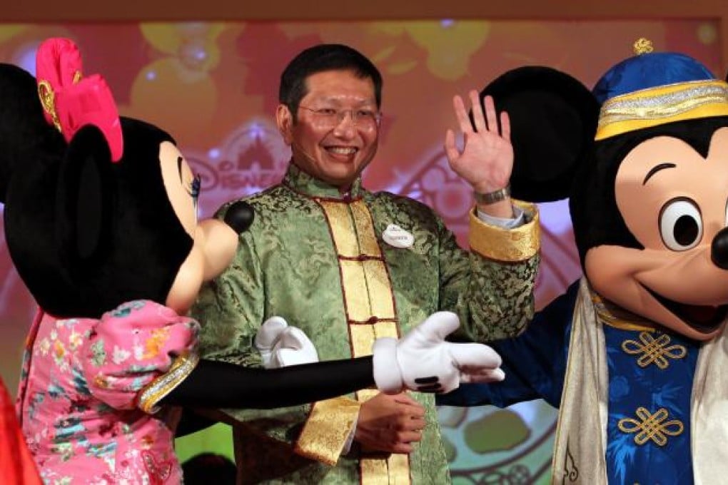 Hong Kong Disneyland managing director Andrew Kam with friends at the park's annual business review press conference. Photo: Nora Tam