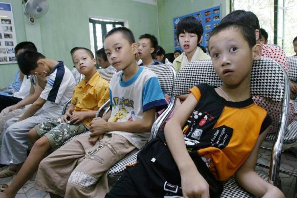 Child victims of Agent Orange are taught vocational skills at Friendship Village. Photo: AFP