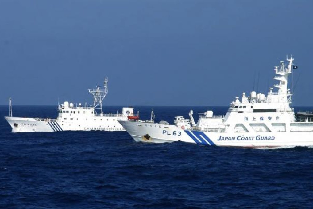 The Japan Coast Guard and a Chinese ship in the East China Sea on February 4. Photo: AFP