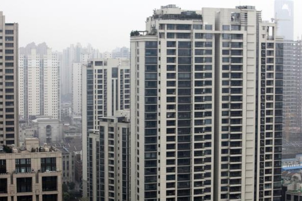 In Shanghai, the average price of a flat stood at 27,655 yuan per square metre last month. Photo: Bloomberg