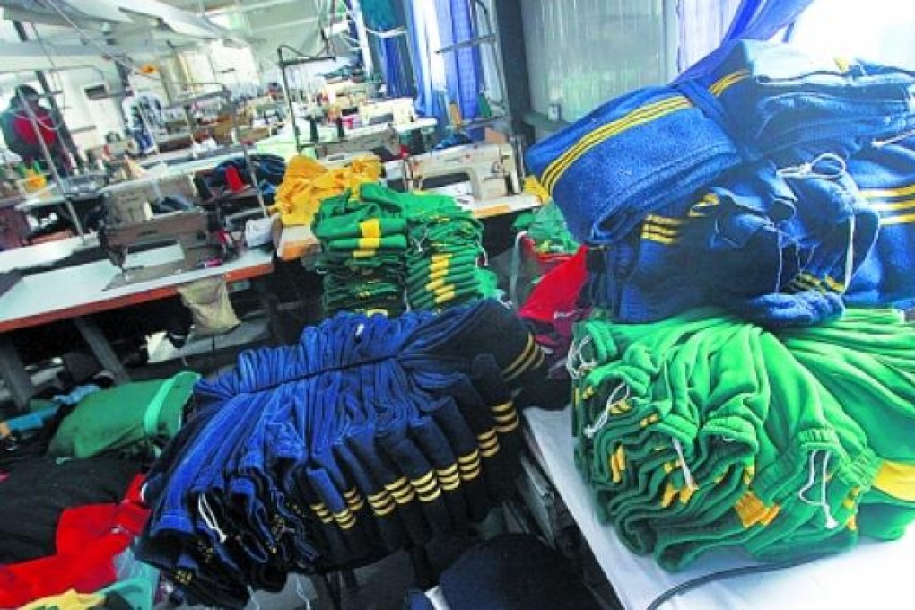 Uniforms made by Ou'xia Clothing seen in the factory. Photo: Xinhua