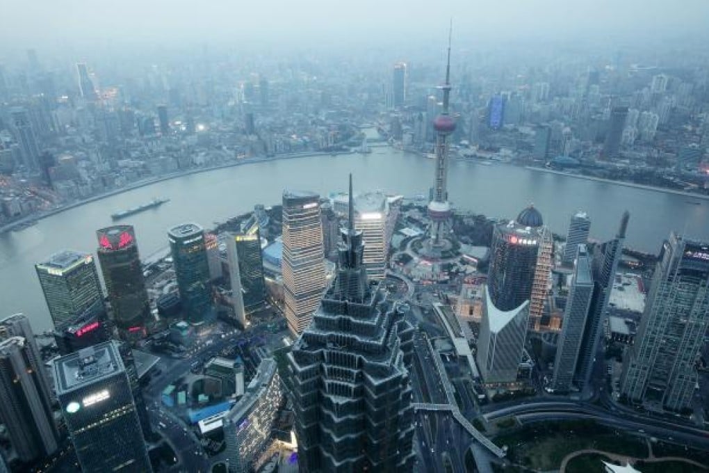 The height of Shanghai's towers may keep climbing forever, but not so home prices. Photo: Bloomberg