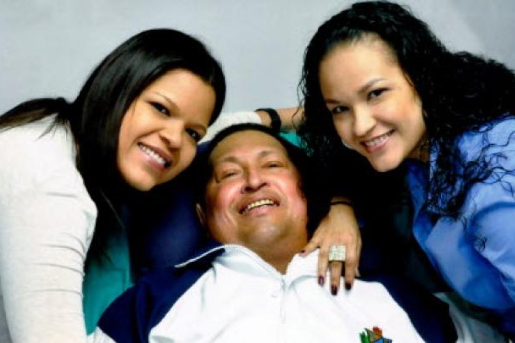 Venezuela's President Hugo Chavez (centre) last week with his daughters, Maria Gabriela (left) and Rosa Virginia in Havana, Cuba. Photo: AP