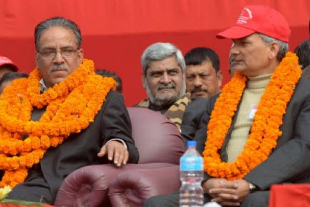 Chairman of Unified Communist Party of Nepal (Maoist), Pushpa Kamal Dahal known as Prachanda (left) and Nepalese Prime Minister Baburam Bhattarai (right). Photo: AFP
