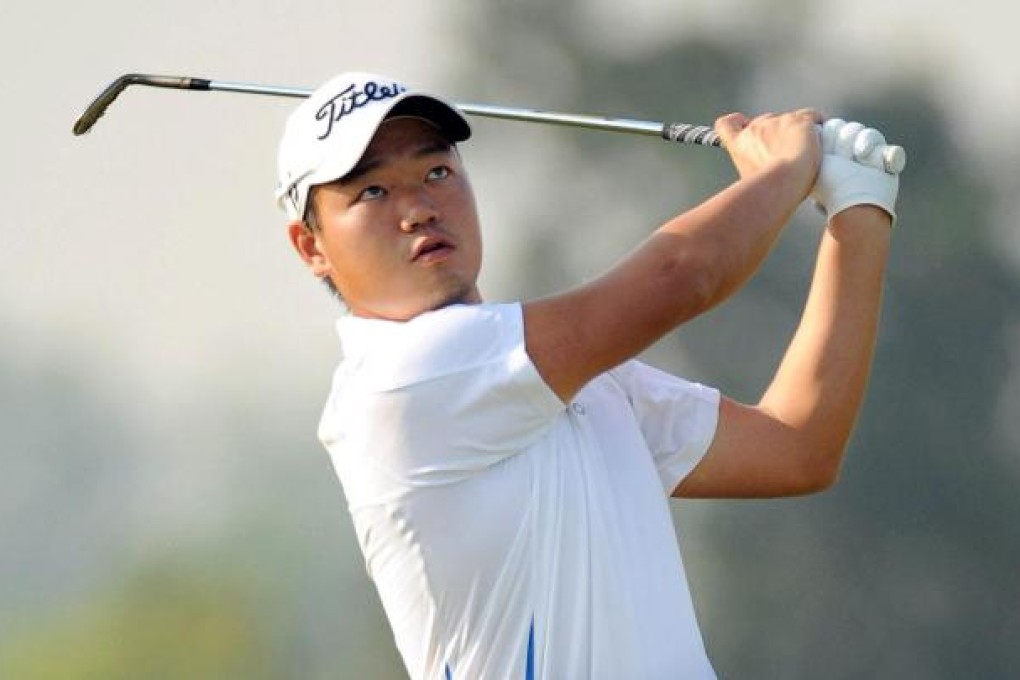 Chinese golfer Hu Mu in action during a practice round at the Zaykabar Myanmar Open in Yangon yesterday. Photo: SCMP