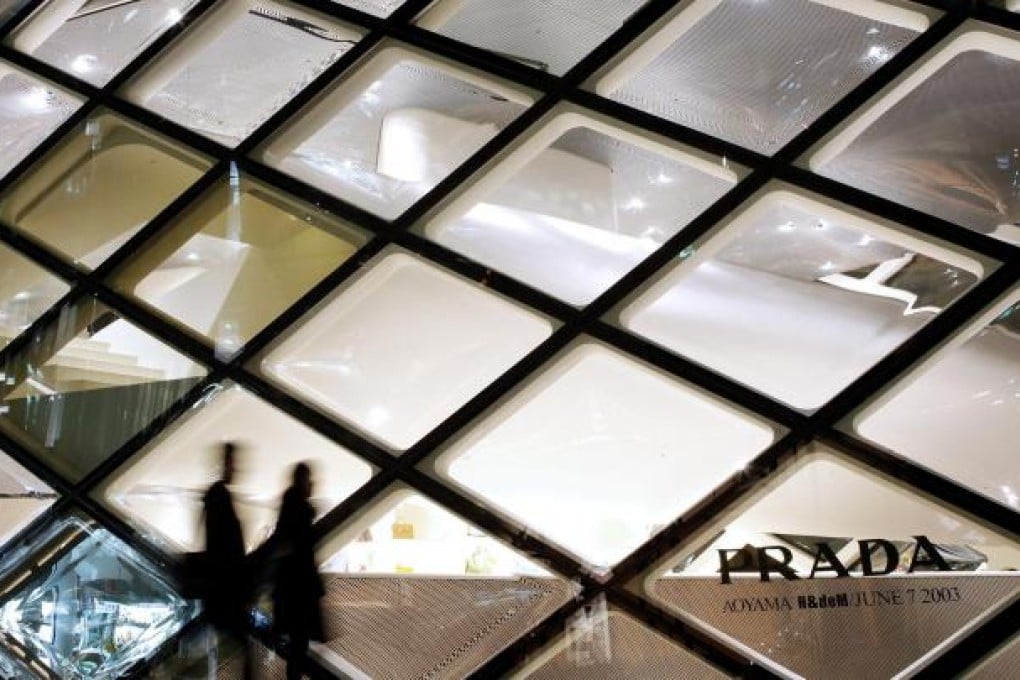 Prada added 78 stores to its retail network last year, helping drive group revenue. Photo: Bloomberg