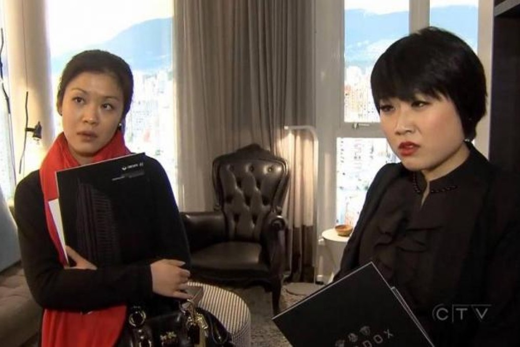A screen grab from a CTV interview with Amanda (left) and Chris Lee who claimed to be Chinese sisters, bankrolled by their parents, looking to buy an apartment in Vancouver.