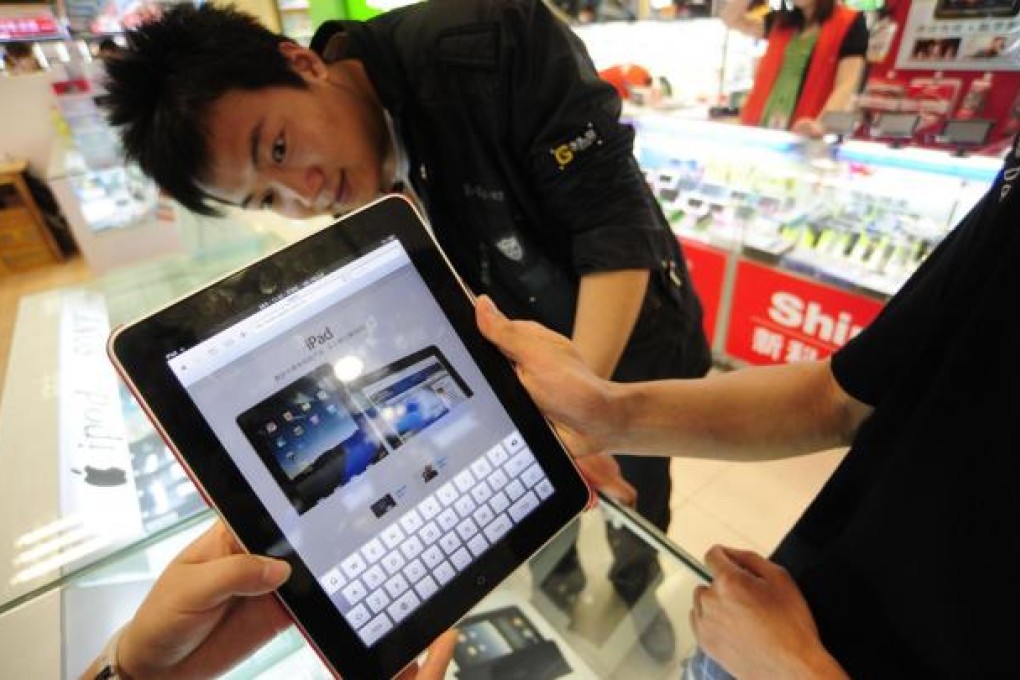 The number of mainlanders accessing the internet through devices such as smartphones and tablets has passed 388 million. Photo: Reuters