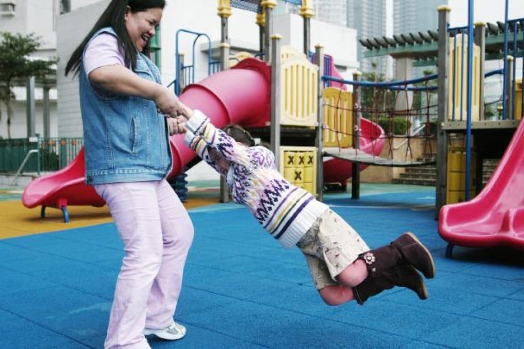 Mothers can get jealous of the bond between their children and the domestic helper. Photo: Oliver Tsang