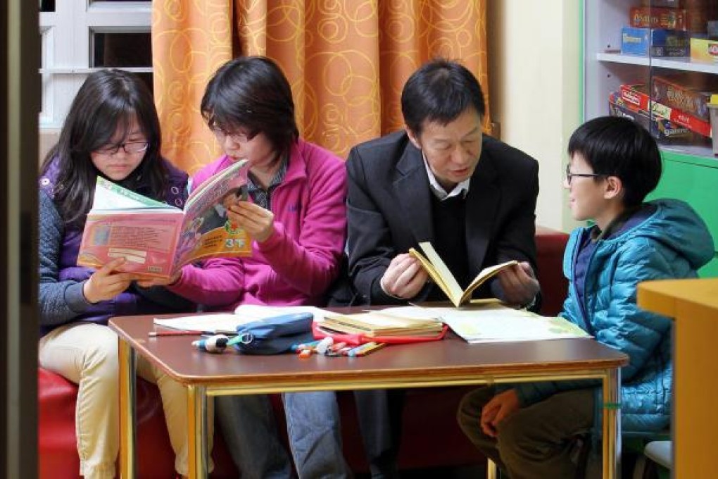 Parents Pang Chi-keung and Flora Chan are careful how they reward their daughter Bowie and son Jimmi. Photo: Dickson Lee