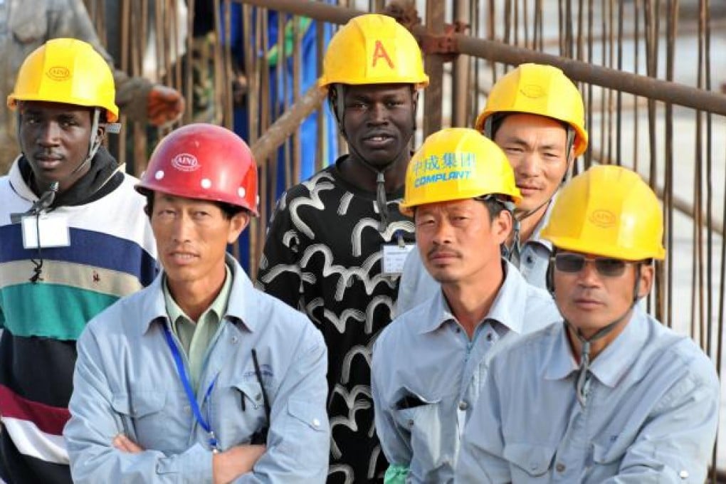 Migrant workers from the mainland, such as these construction workers in Senegal, are willing to make sacrifices to escape poverty at home. Photo: AFP
