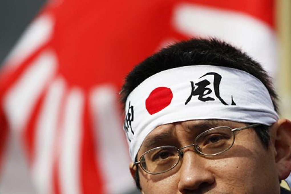 A protester takes part in an annual Takeshima Day anti-South Korea rally in Tokyo on Friday over the disputed islands called Takeshima in Japan and Dokdo in South Korea. Photo: Reuters