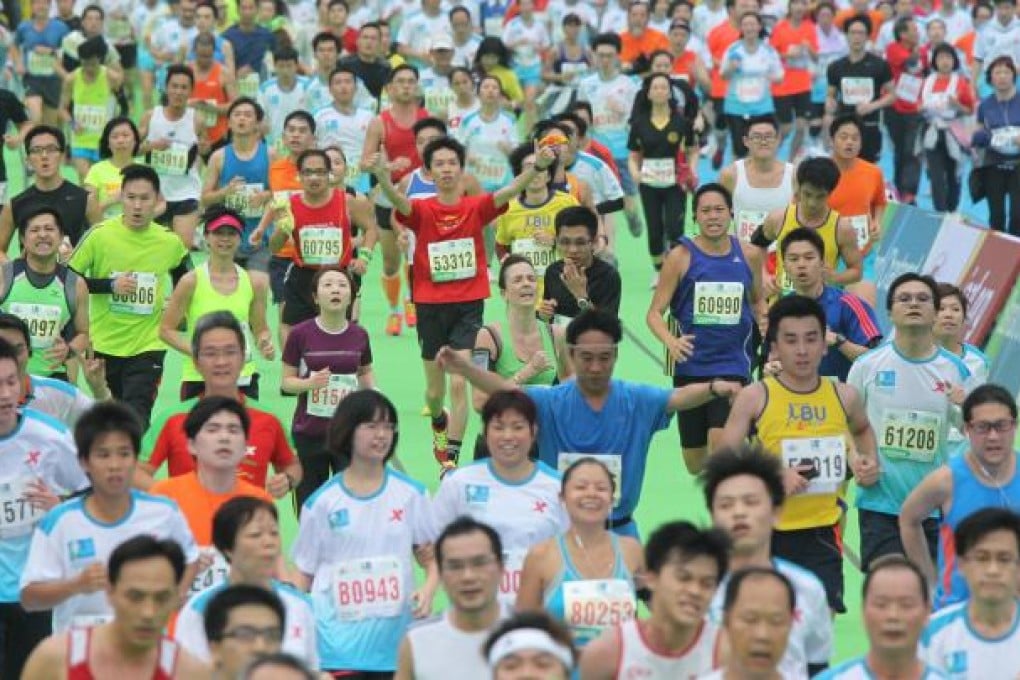 Thousands of runners hit the streets. Photo: K.Y. Cheng