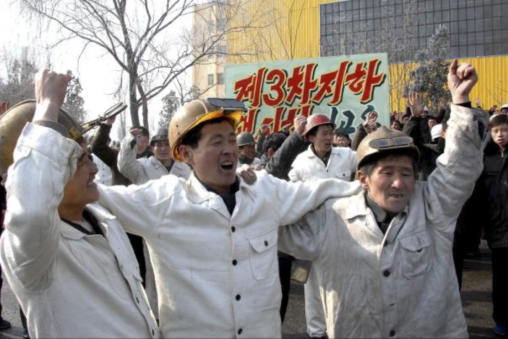 North Korean workers at the Chollima Steel Complex celebrate North Korea's nuclear test on February 13, 2013. Photo: Reuters