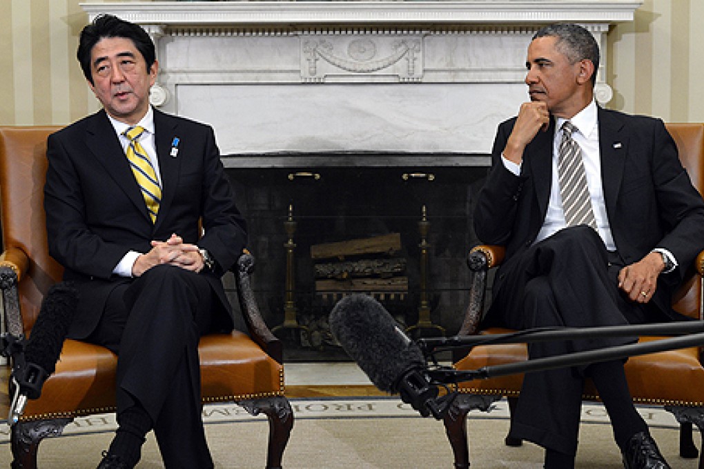 Japanese Prime Minister Shinzo Abe meets with US President Barack Obama in Washington on Friday. Photo: AFP