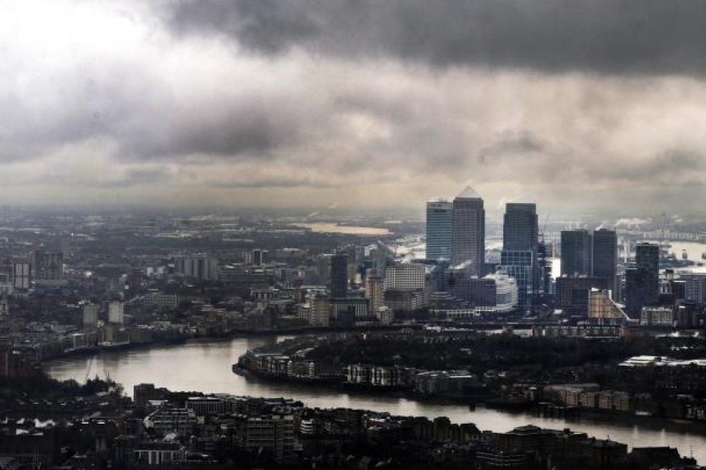 London's financial district. Moody's stripped Britain of its coveted AAA credit rating.