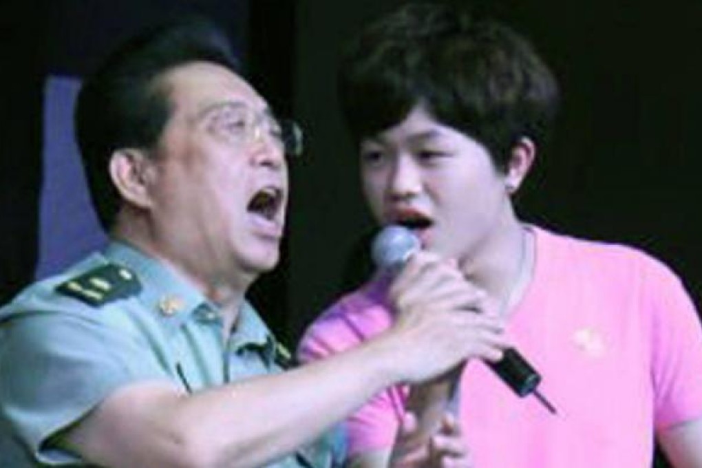 Li Shuangjiang (left) and his son Li Guanfeng. Photo: SCMP