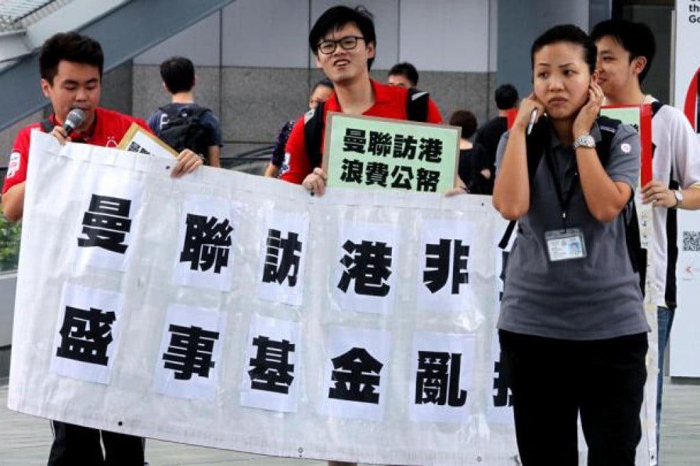 A protest at Admiralty against a HK$8 million handout from the government's Mega Events Fund to invite Manchester United. Photo: May Tse