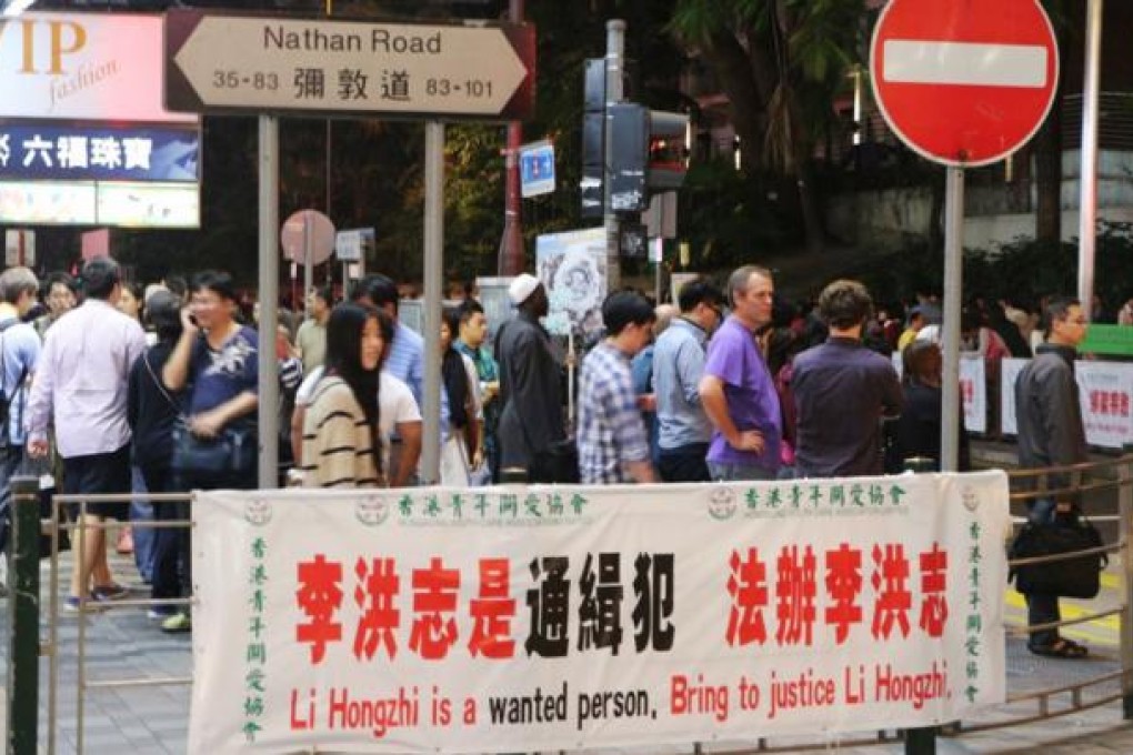 Anti-Falun Gong banners have been put up in Tsim Sha Tsui, on Nathan Road, Jordan and in Causeway Bay. Photo: SMP Pictures