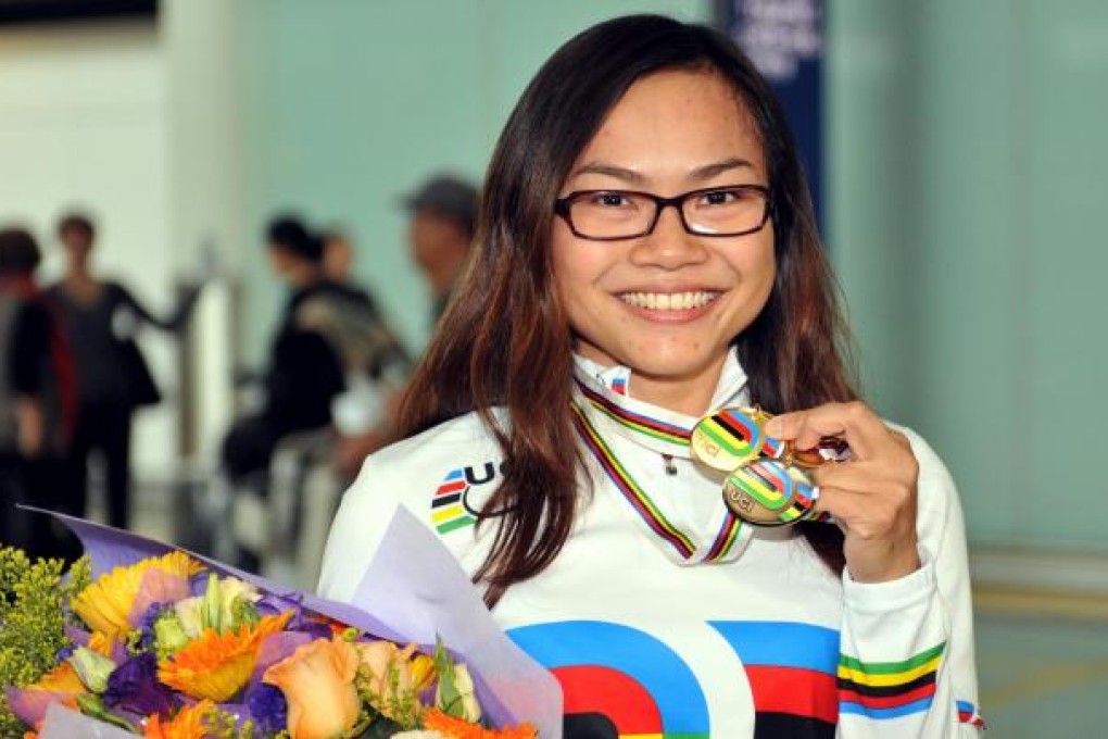 Sarah Lee Wai-sze with her gold and bronze medals.
