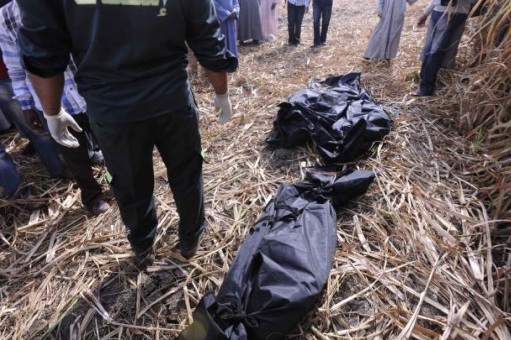The bodies of victims in bags. All eight balloon operators in Luxor are understood to have suspended activities. Photo: Reuters