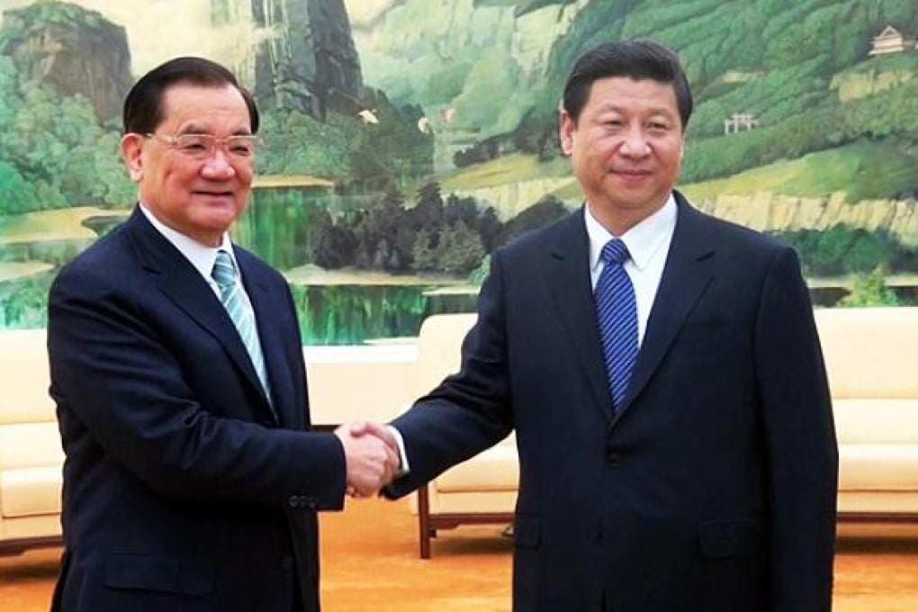 Lien Chan shakes hands with Xi Jinping in Beijing. Photo: Reuters