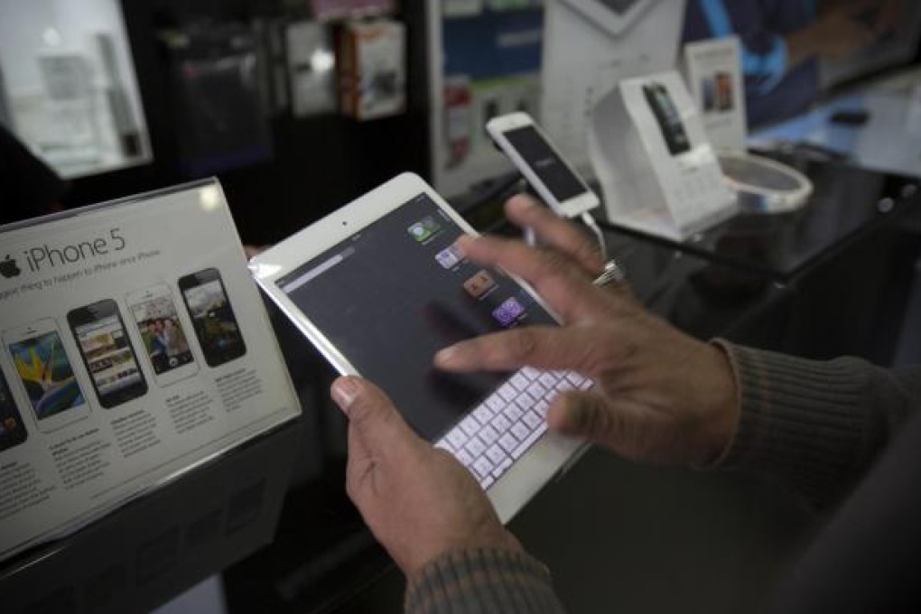 An iPad Mini is a window to a world of apps. Photo: Bloomberg