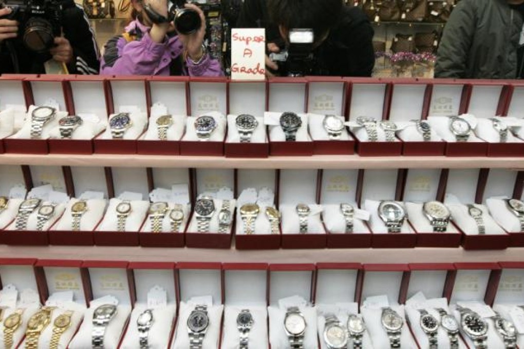 Oi Wah provides cash in return for valuables such as gold, jewellery, watches and even properties. Photo: Felix Wong