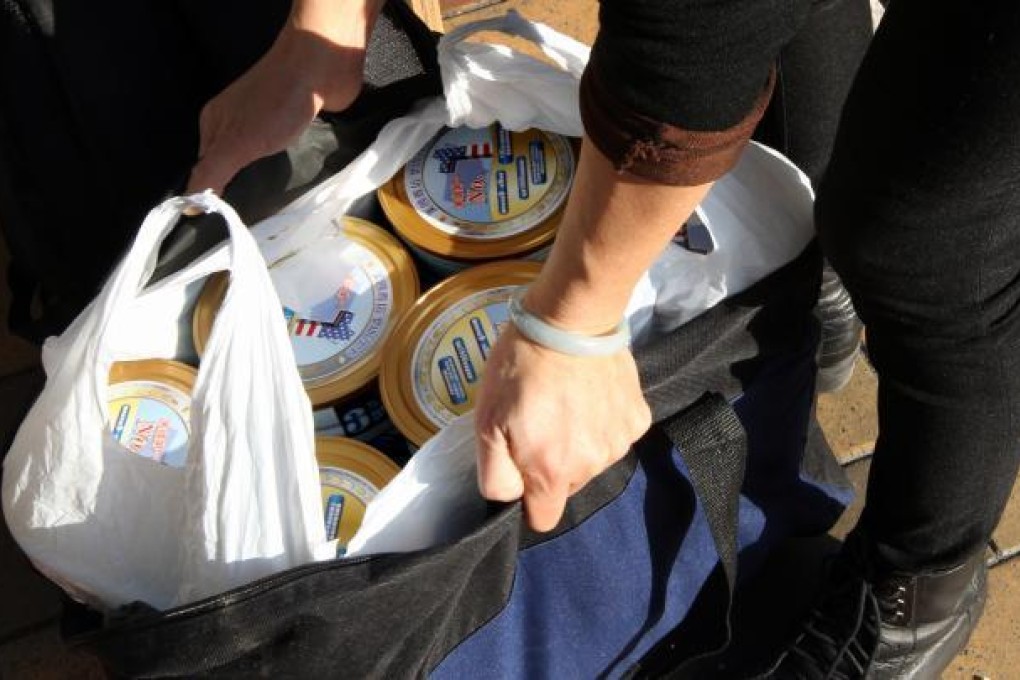 Online purchase of milk powder will be outlawed under Beijing's new regulations. Picture: SCMP