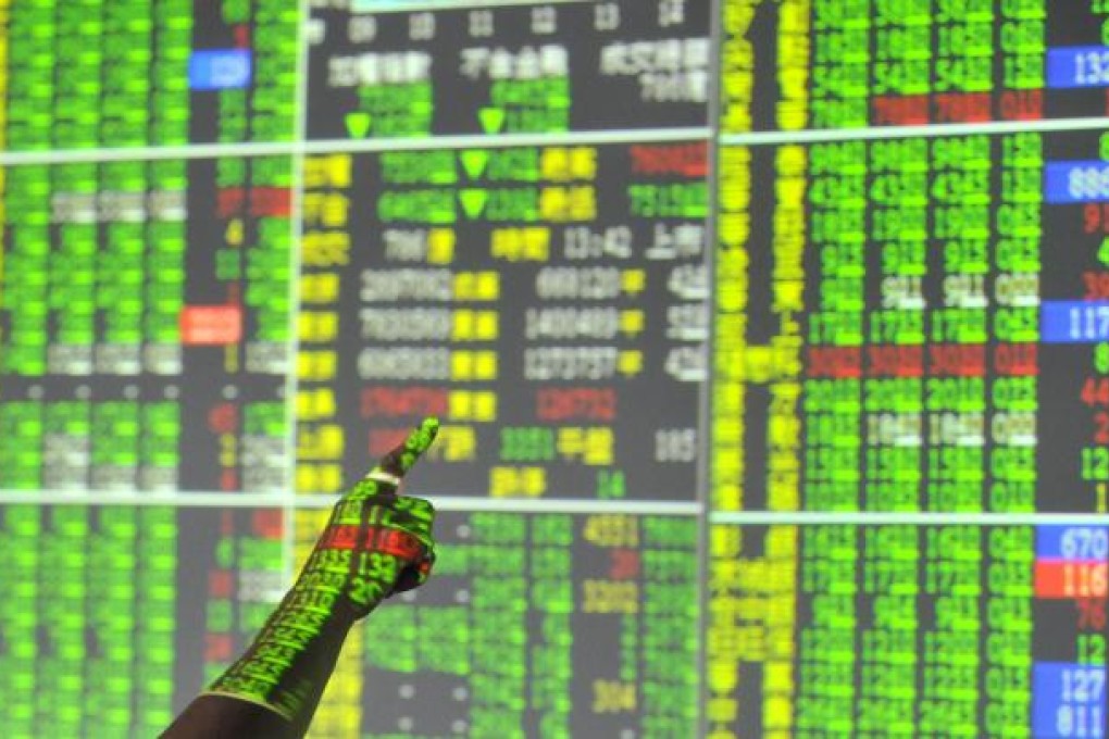 Comments from the head of the US central bank have provided a fillip for Asian markets, which were generally higher in morning trade on Wednesday. Photo: AFP