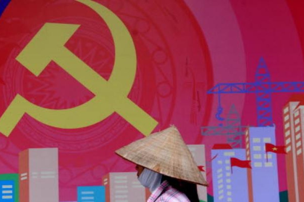 A poster marking the 83th anniversary of the foundation of Vietnamese Communist Party. Vietnam’s government says it will not tolerate criticism of one-party rule.  Photo: AP