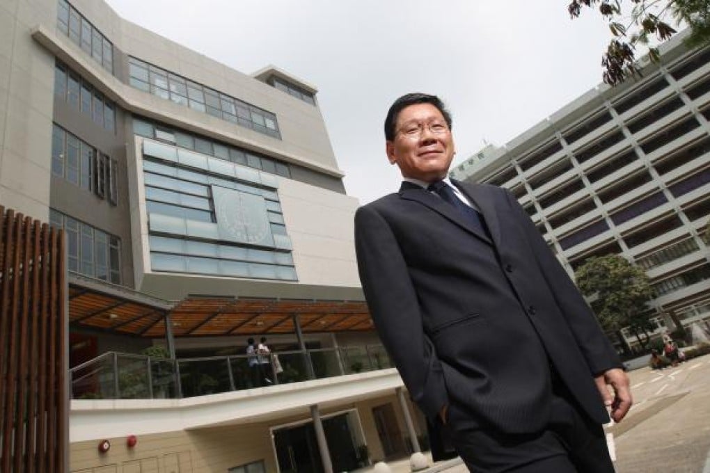 Professor Gilbert Fong is so busy trying to raise his institution's profile he barely has enough time to do his day job. Photo: Felix Wong