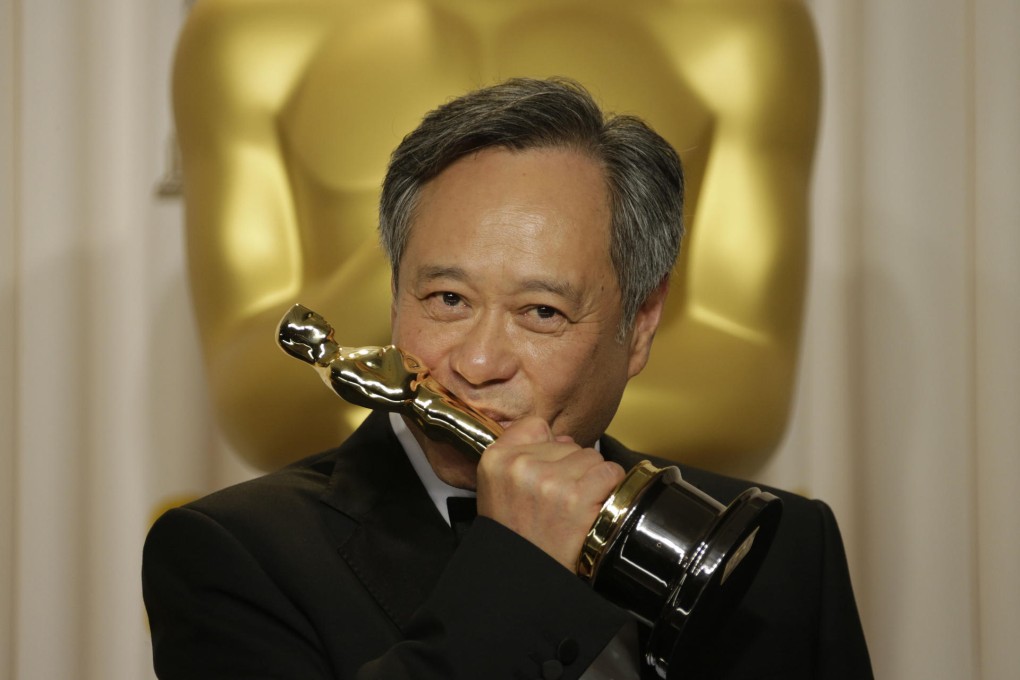 Ang Lee with the best director award forLife of Pi at the Oscars.Photo: MCT