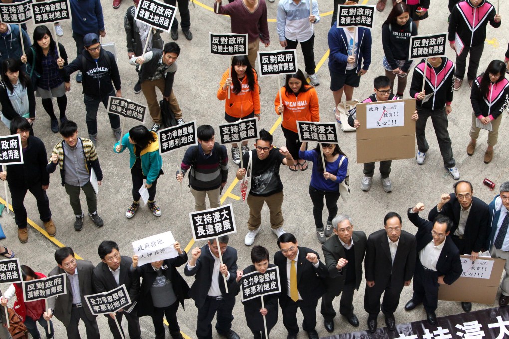 About 50 students and lecturers protest against plans to build flats near the Baptist University campus. Photo: David Wong