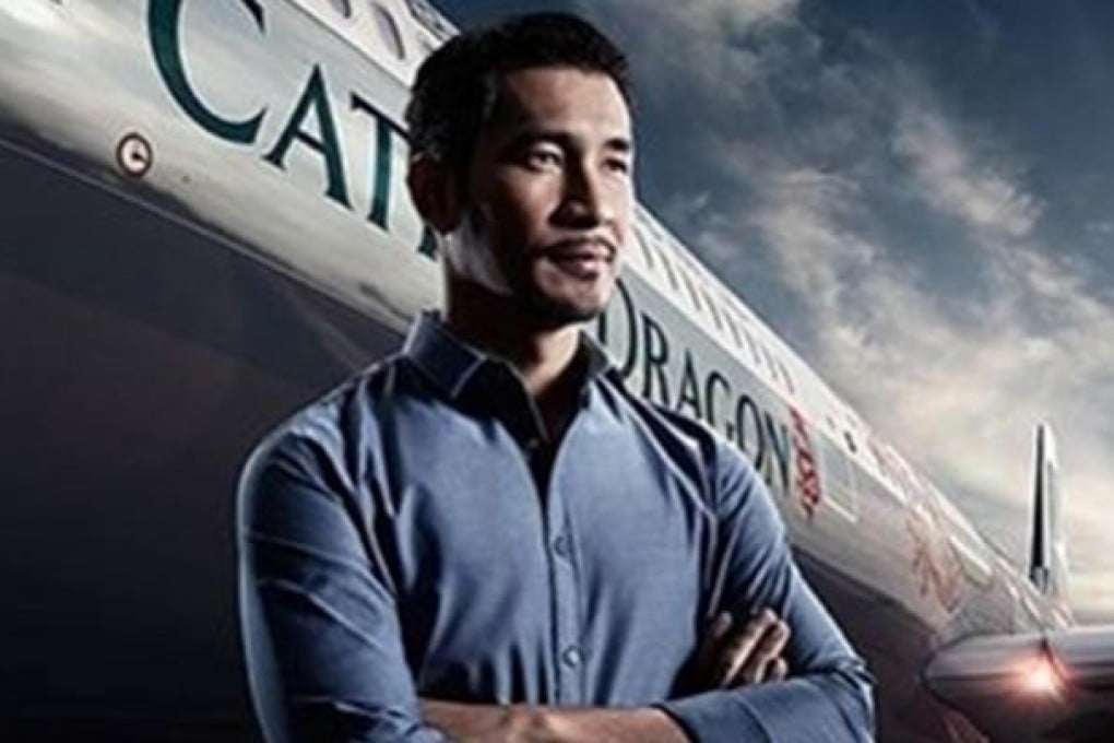 An image showing a model posing in front of the words 'Cathay Dragon'. Photo: SCMP Pictures