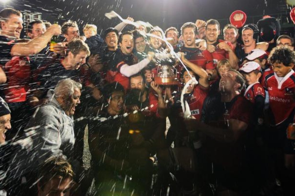 Valley players celebrate after defeating HKCC 16-15 in last night's grand championship final at King's Park. Photo: Felix Wong