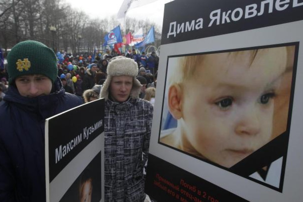 Moscow protesters urge end of foreign adoptions. Photo: Reuters