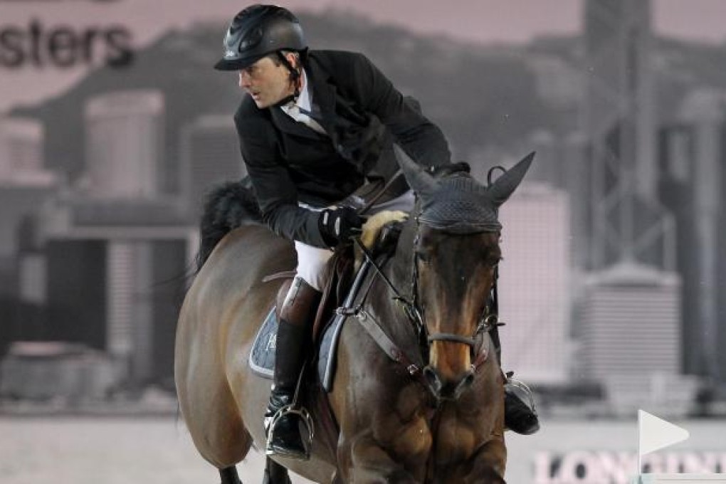 Frenchman Patrice Delaveau rides Lacrimoso 3 to victory in the Gucci Gold Cup at the Longines Hong Kong Masters. Photo: K. Y. Cheng