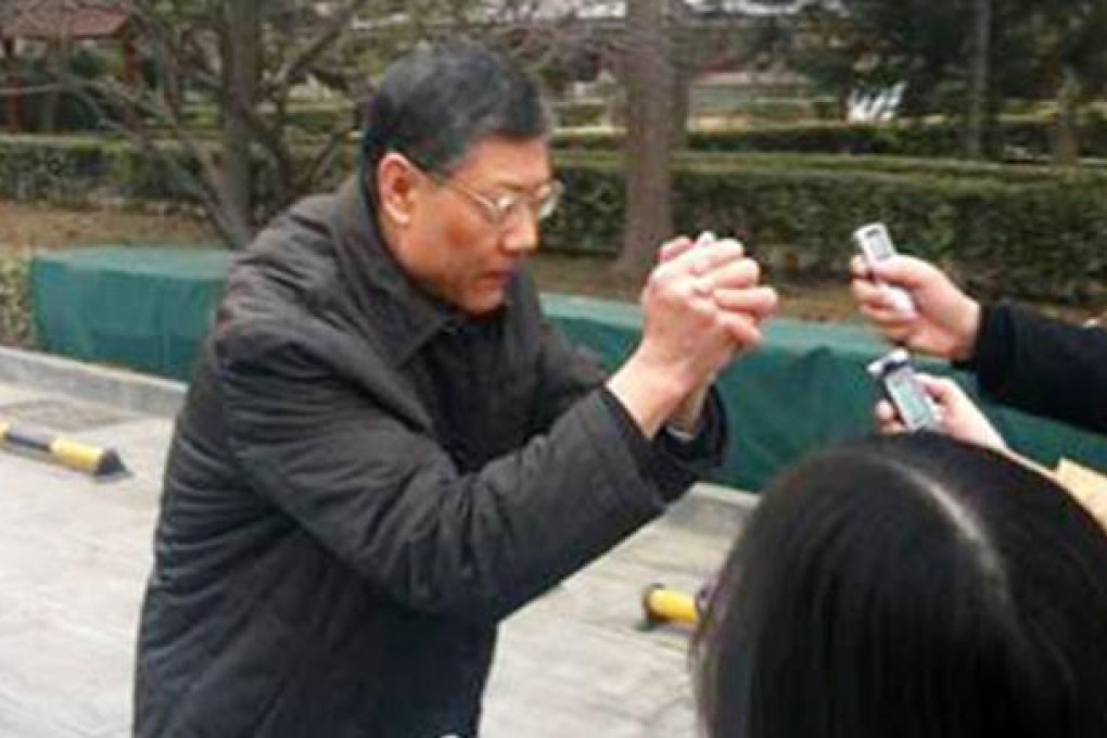 Jiang Weixin 'begs' reporters to spare him. Photo: SCMP